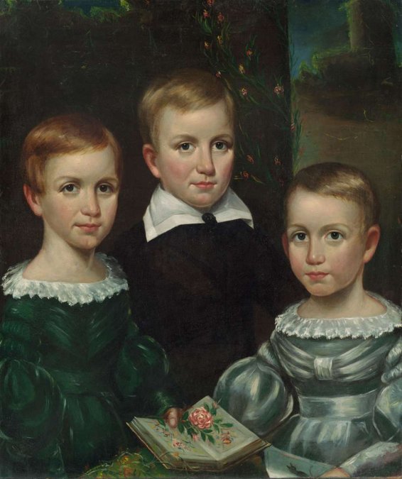 Emily Dickinson (izquierda) con sus hermanos