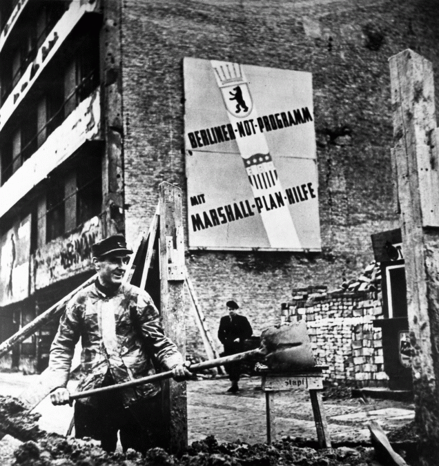 El cartel anuncia la financiación, a través del Plan Marshall, de parte de las obras de reconstrucción de Alemania Occidental.