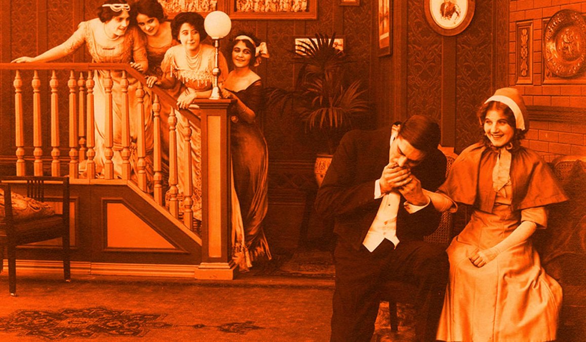  Imagen promocional de Florence Lawrence (en primer término, sentada) de una de sus películas de cine mudo.